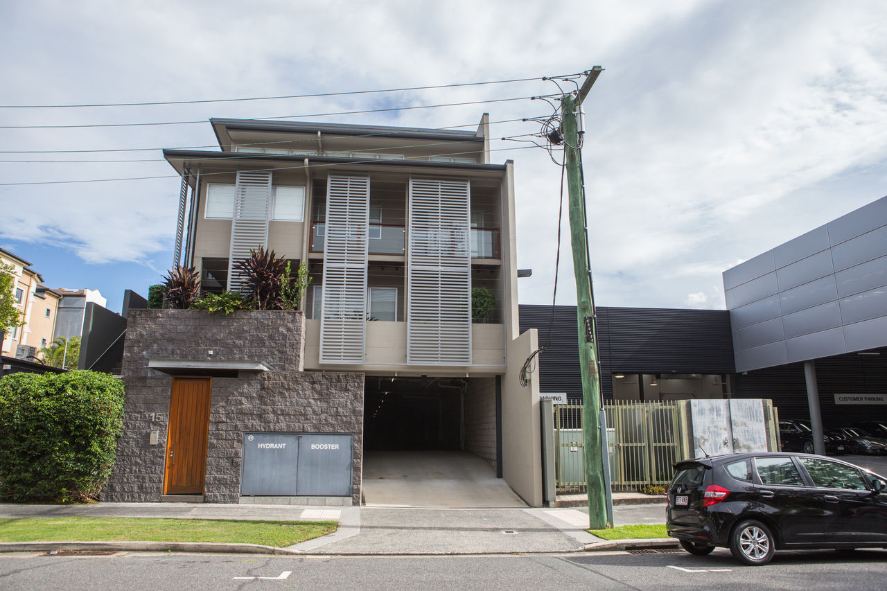 Unit complex at Halford Street, Newstead. Shows driveway to underground car park.