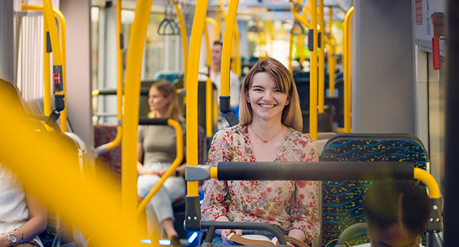 Female passenger on seated on Metro vehicle