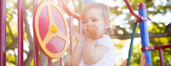 Toddler playing in playground at Perth Street Park Camp Hill