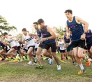 Adult runners starting a race a the Victoria Park Adventure Festival.